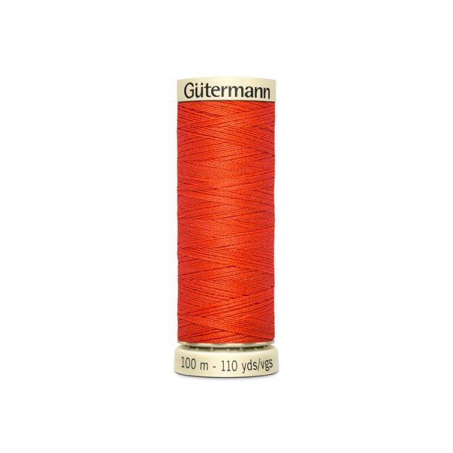 Univerzální šicí nit Gütermann v sytě oranžové barvě 155