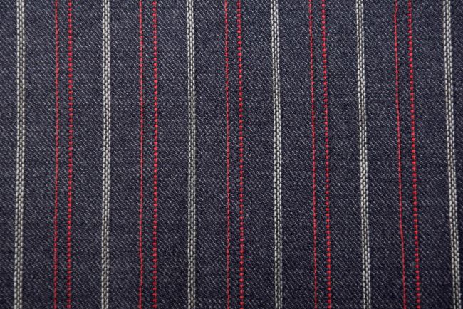 Obleková látka v modré barvě s tkaným vzorem pruhů TI413