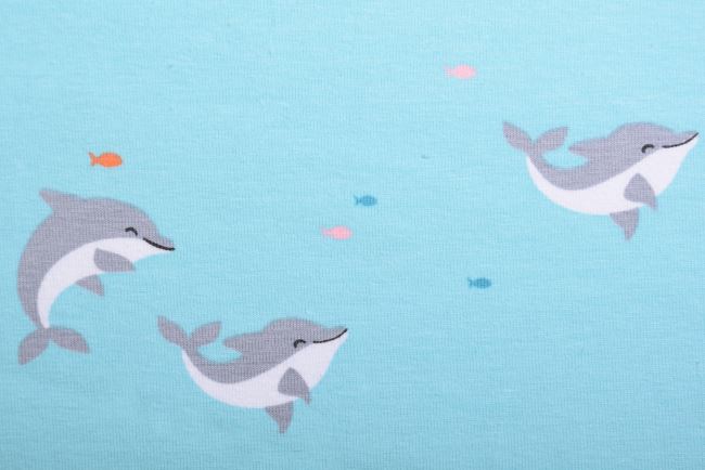 Bavlněný úplet v mentolové barvě s potiskem delfínů 19578/022