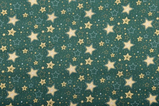 Vánoční látka z bavlny v tmavě zelené barvě se zlatými hvězdičkami 12715/025