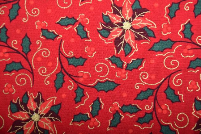 Vánoční látka z bavlny v červené barvě s potiskem hvězdy a cesmíny 18727/015
