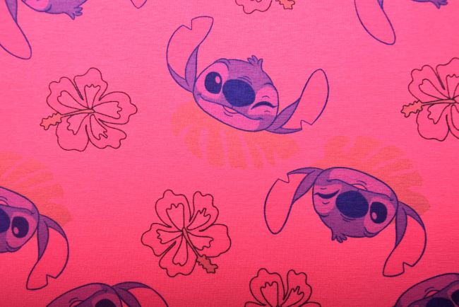 1 m bavlněného úpletu v růžové barvě s pohádkovou postavou Stitch DS-KUP157