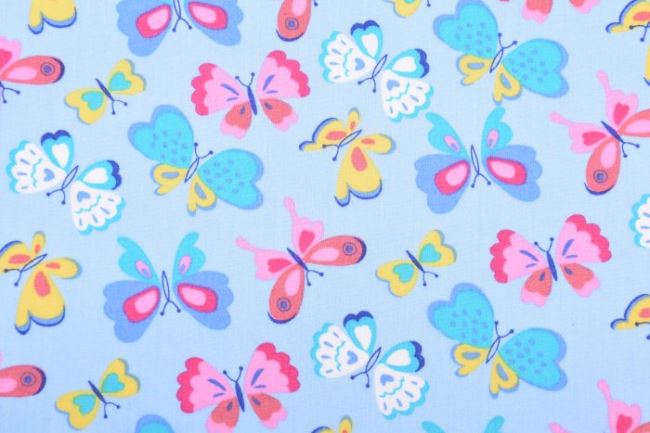 Bavlněná látka v modré barvě s barevnými motýlky 11131/002
