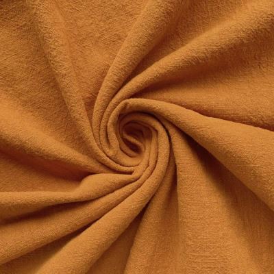 Praný len stonewashed v okrové barvě 02155/580K