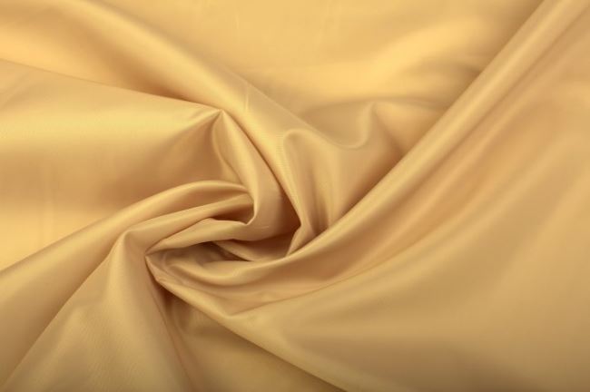 Polyesterová podšívka ve zlatavé barvě 0160/592