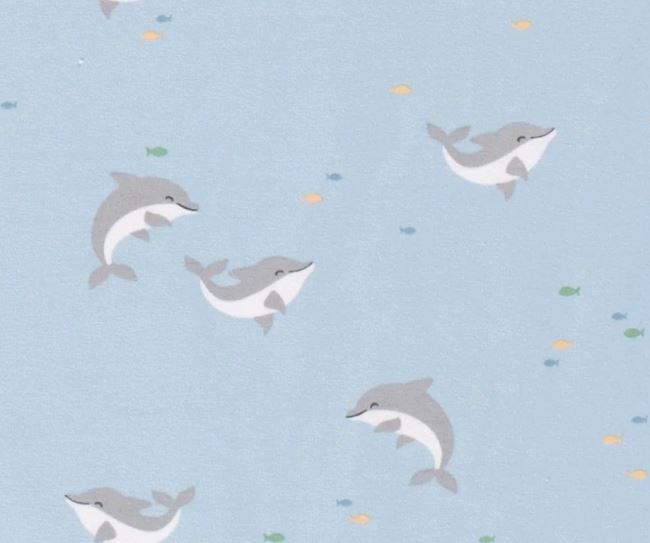 Bavlněný úplet ve světle modré barvě s potiskem delfínů 19578/003