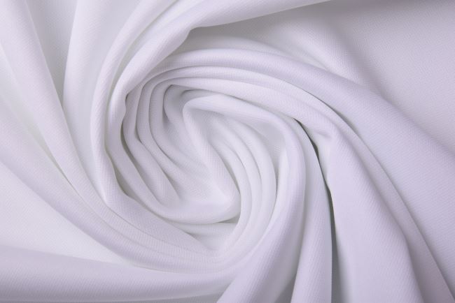 Kostýmová elastická látka v bílé barvě 0802/001