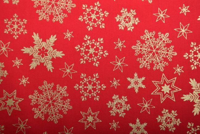 Vánoční látka z bavlny v červené barvě s potiskem vloček 18728/015