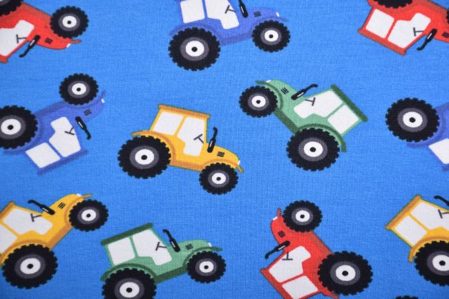 Bavlněný úplet v modré  barvě s potiskem traktorů 16620/003