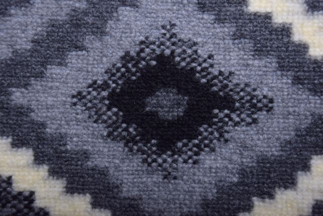 Pletenina v šedé barvě s aztéckým vzorem imitující vařenou vlnu 19420/980