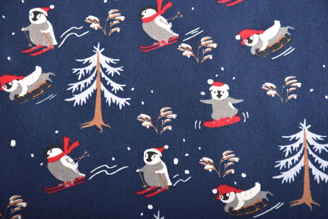Vánoční látka z bavlny v modré barvě s potiskem tučňáků K15025-008D