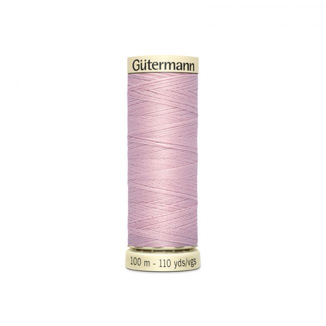 Univerzální šicí nit Gütermann s jemným nádechem fialové barvy 662